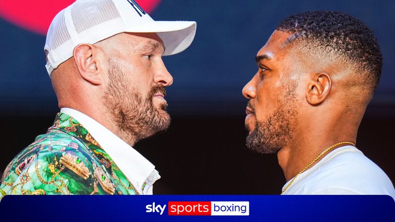 Tyson Fury faces off with Anthony Joshua. Pic AP