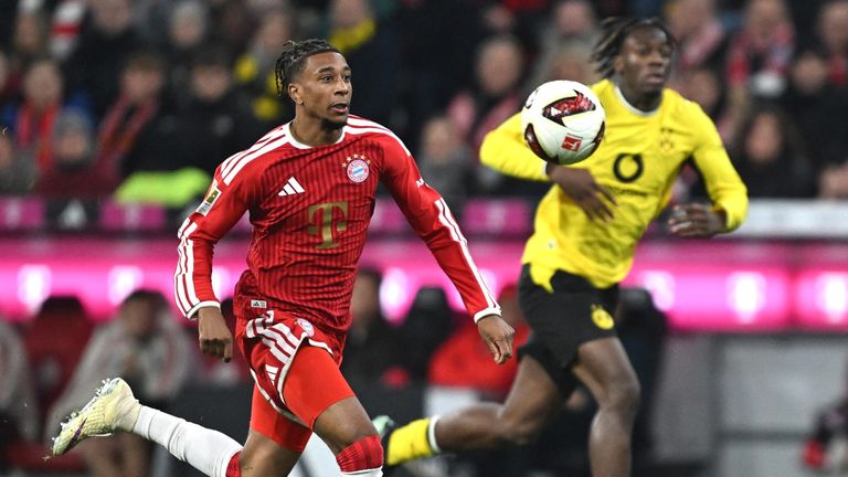 Michael Olise runs at the Dortmund defence