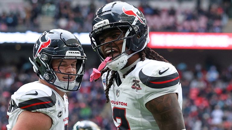 Houston Texans safety Calen Bullock (2) reacts after making an interception during an NFL football game against Jacksonville Jaguars in London, Sunday, Oct. 18, 2026. (AP Photo/Ian Walton)
