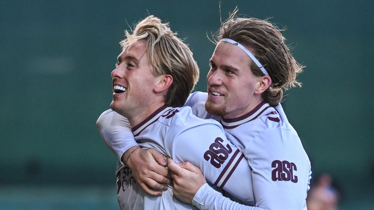 Hearts' Calvin Miller (L) celebrates with Jordi Altena (R) after scoring to make it 2-0 