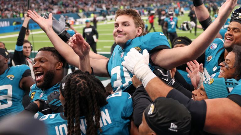 Jacksonville Jaguars place kicker Cam Little (39) celebrates after scoring the winning field goal during an NFL football game against Philadelphia Eagles in London, Sunday, Oct. 11, 2026. (AP Photo/Ian Walton)