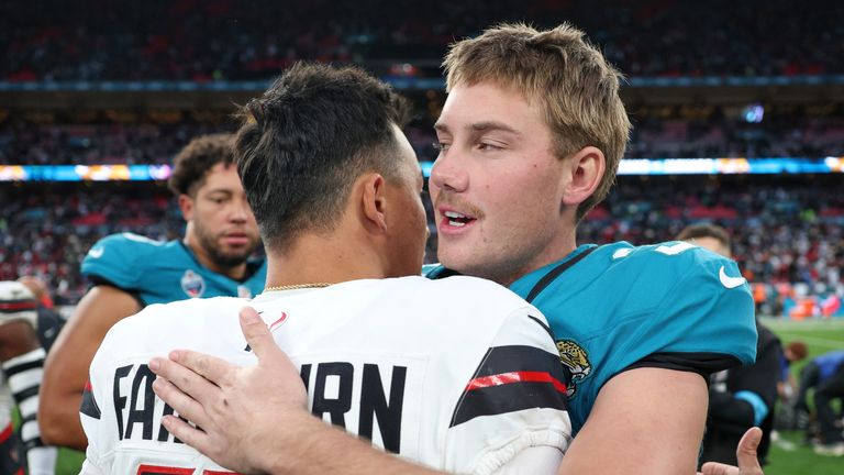 Houston Texans place kicker Ka'imi Fairbairn (15) Is embraced by Jacksonville Jaguars place kicker Cam Little 