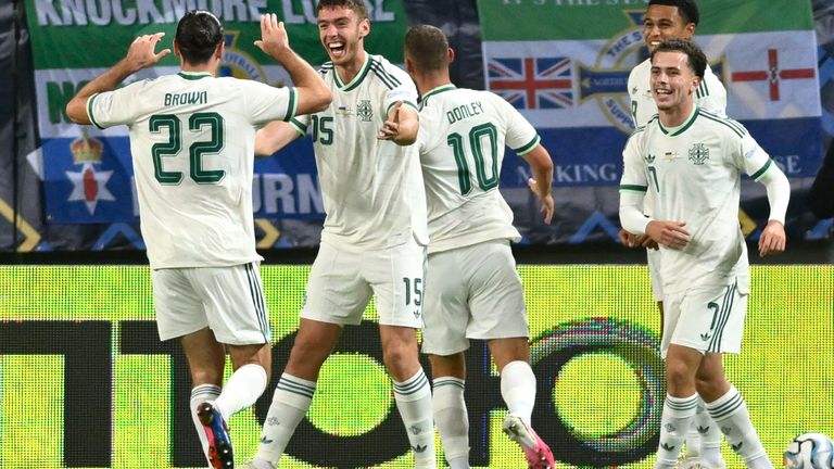 Northern Ireland's Ciaron Brown (centre) celebrates after scoring against Ukraine