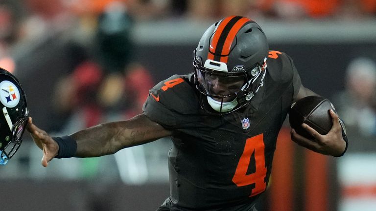 Cleveland Browns quarterback Deshaun Watson runs past Pittsburgh Steelers safety Jaquan Brisker during the second half of an NFL football game in Cleveland, Thursday, Oct. 1, 2026. (AP Photo/Sue Ogrocki)