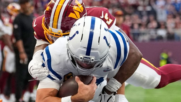 Indianapolis Colts quarterback Daniel Jones dives in for the game-clinching touchdown in the fourth quarter