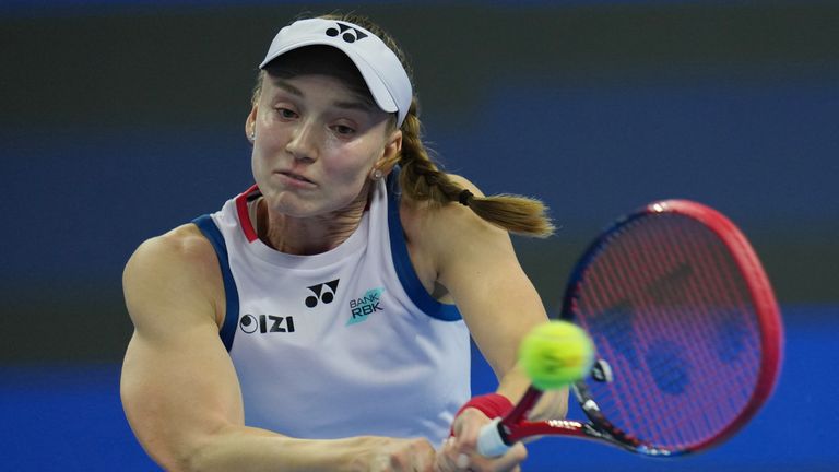 Elena Rybakina, of Kazakhstan, returns a ball to Alina Charaeva, of Armenia, during the second round of the women's singles match at the China Open tennis tournament in Beijing, Saturday, Oct. 3, 2026. (AP Photo/Ng Han Guan) CORRECTION: Corrects country of Alina Charaeva to Armenia instead of Russia