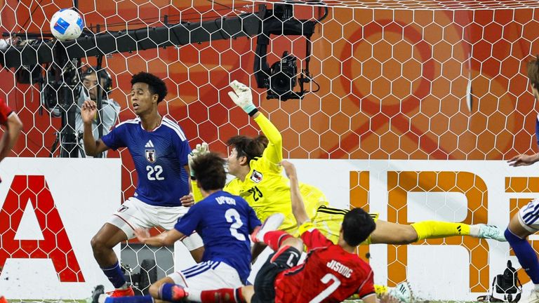 South Korea's Ji-Sung Eom scores for South Korea against Japan in the Asian Games final