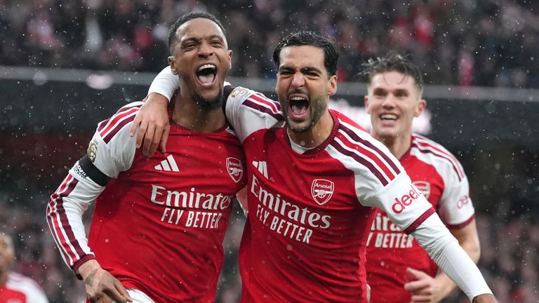 Arsenal's Ezri Konsa (left) celebrates scoring their side's first goal of the game