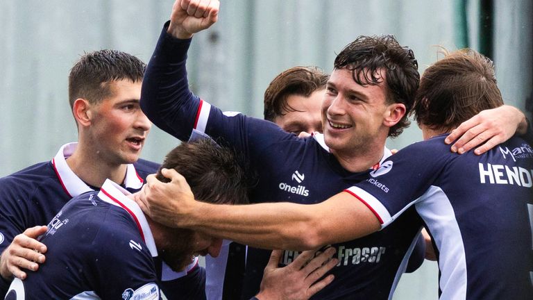 Falkirk's Jacob Murrell (C) celebrates with team mates after scoring to make it 2-0