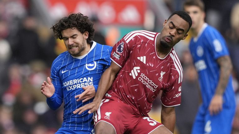 Ferdi Kadioglu and Ryan Gravenberch battle for possession
