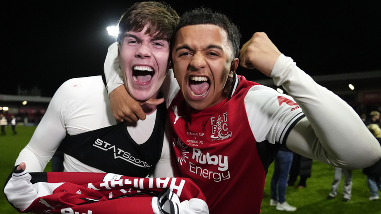 Fleetwood Town's Conor Haughey (left) celebrates scoring the winning penalty in the shoot-out with team-mate Rafaele Cirin