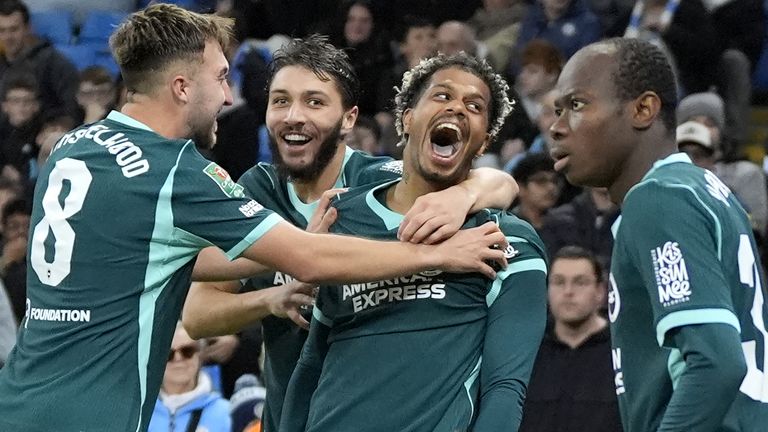 Georginio Rutter (second right) celebrates scoring Brighton's second goal against Manchester City