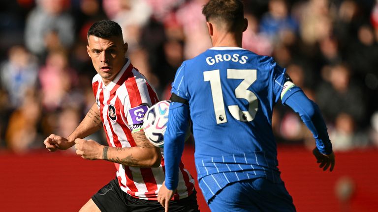 Sunderland's Granit Xhaka (L) vies for possession with Brighton's Pascal Gross