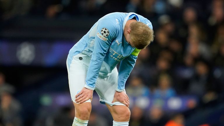 Haaland hangs his head after defeat to PSG