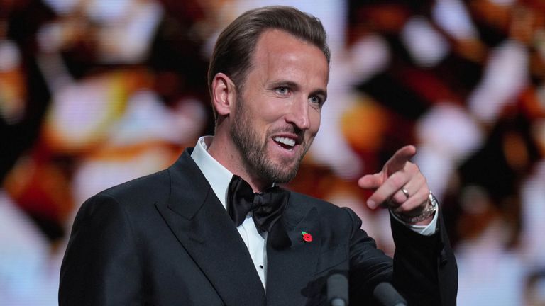 England's soccer player Harry Kane wins the trophy for striker of the year during the Ballon d'Or ceremony at the London Palladium Theatre in London, England, Monday, Oct. 26, 2026 . (AP Photo/Kin Cheung)