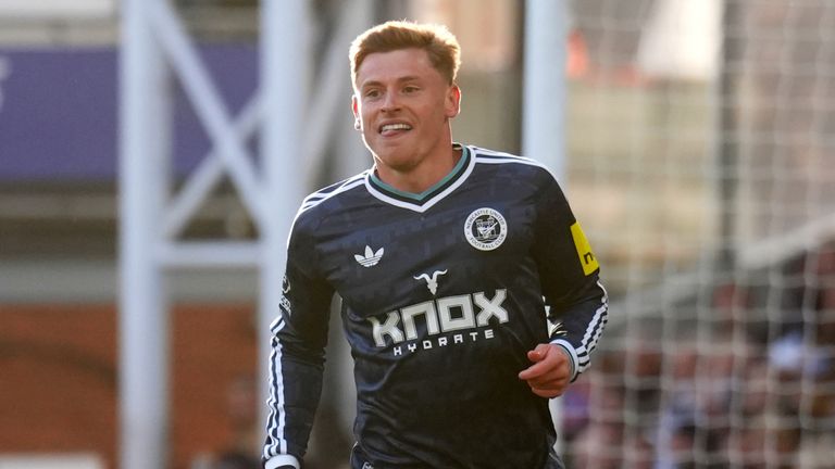 Harvey Barnes wheels away in celebration after extending Newcastle's lead