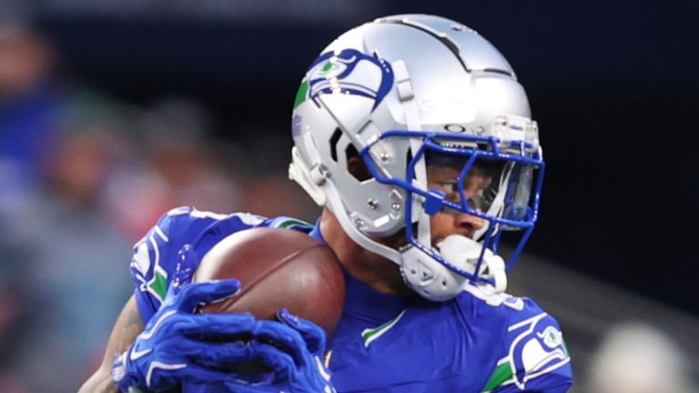 Smith-Njigba, pictured catching the ball during the first half 