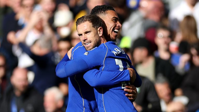 Jordan Henderson embraces Morgan Rogers after giving Chelsea the lead