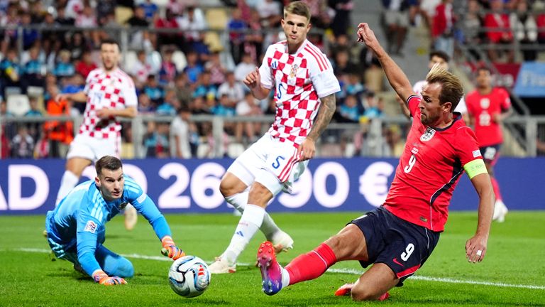 Harry Kane slides in England's fifth goal against Croatia