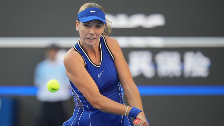 Katie Boulter of Britain returns a ball to Karolina Muchova of Czech Republic during the second round of the women's singles match at the Ch