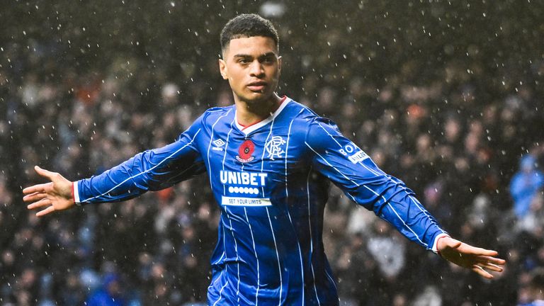 Rangers' Kevin Kelsy celebrates after scoring to make it 3-0