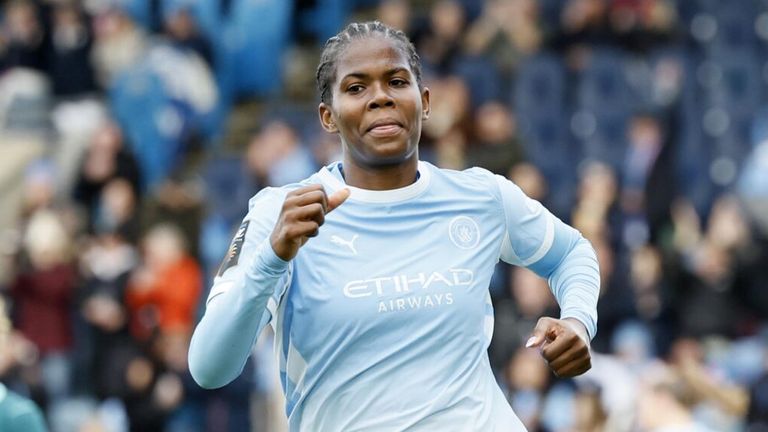 Khadija Shaw celebrates after doubling Man City's lead at Brighton