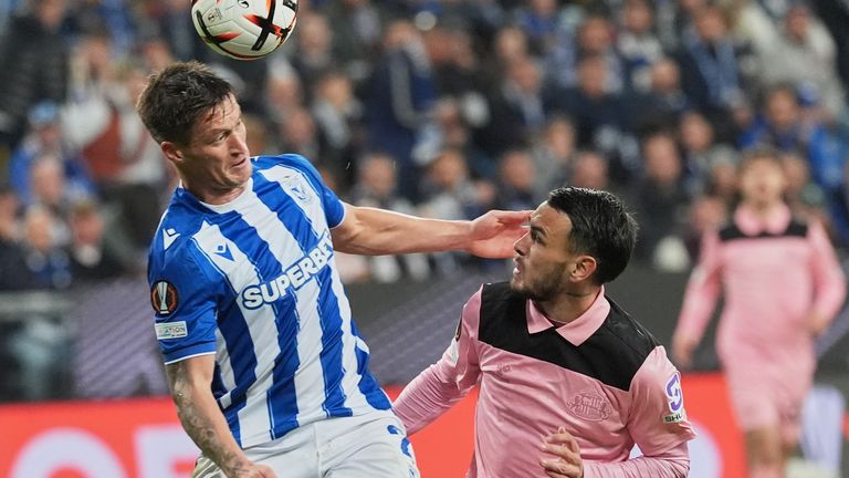 Lech Poznan's Radoslaw Murawski, left, and Sunderland's Enzo Le Fee challenge for the ball during the Europa League opening phase soccer match between Lech Poznan and Sunderland in Poznan, Poland, Thursday, Oct. 22, 2026. (AP Photo/Piotr Hawalej)