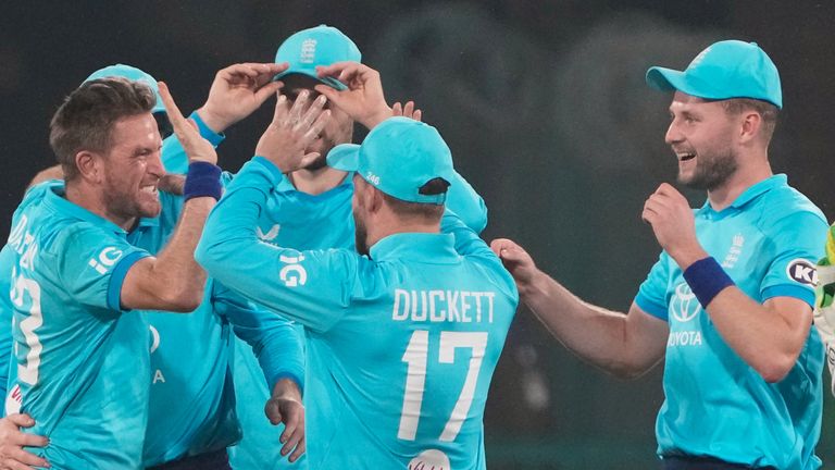 Liam Dawson (far left) claimed seven wickets in three games for England