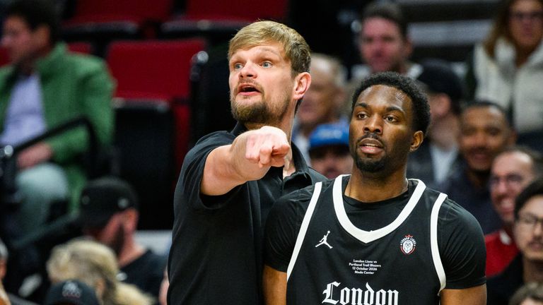 London Lions head coach Tautvydas Sabonis directs guard Keenan Evans and the rest of his team during the game (AP Photo/Molly J. Smith)