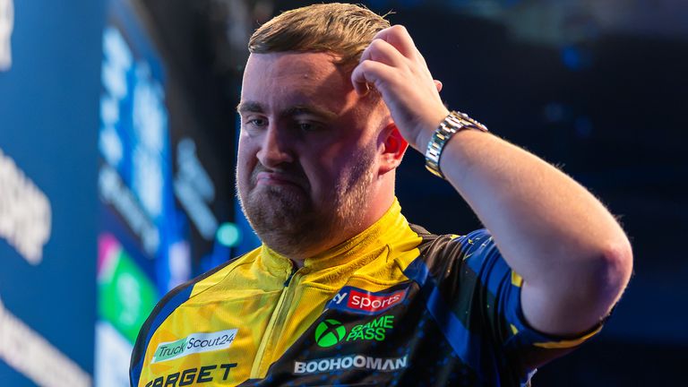 Luke Littler scratches his head during his shock defeat at the European Championship Darts (Pic: Sebastian Doppstadt/PDC)