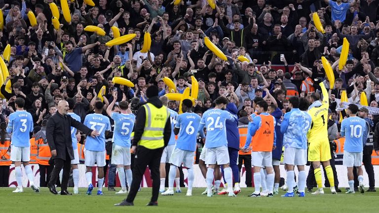 Manchester City celebrated with their fans after beating Liverpool at Anfield
