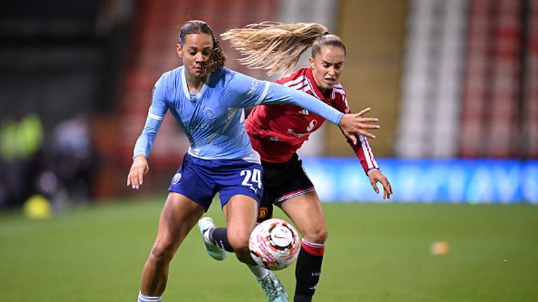 MANCHESTER, ENGLAND - OCTOBER 25: Iman Beney of Manchester City is challenged by Andrea Medina of Manchester United during the Barclays Women's Super League 2026/27 match between Manchester United and Manchester City at Old Trafford on October 25, 2026 in Manchester, England. (Photo by Ben Roberts Photo/Getty Images)