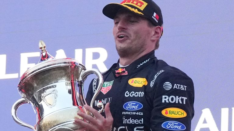 Max Verstappen with the winner's trophy in the Bahrain Grand Prix in Malaysia