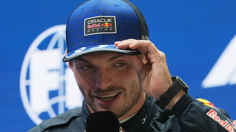Red Bull driver Max Verstappen of the Netherlands speaks after finishing first in the sprint qualifying session ahead of the Singapore Formula One Grand Prix in Singapore, Friday, Oct. 9, 2026. (AP Photo/Ng Han Guan)