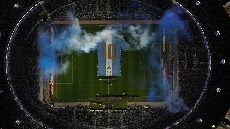 A giant t-shirt with Lionel Messi's number 10 is displayed before the match