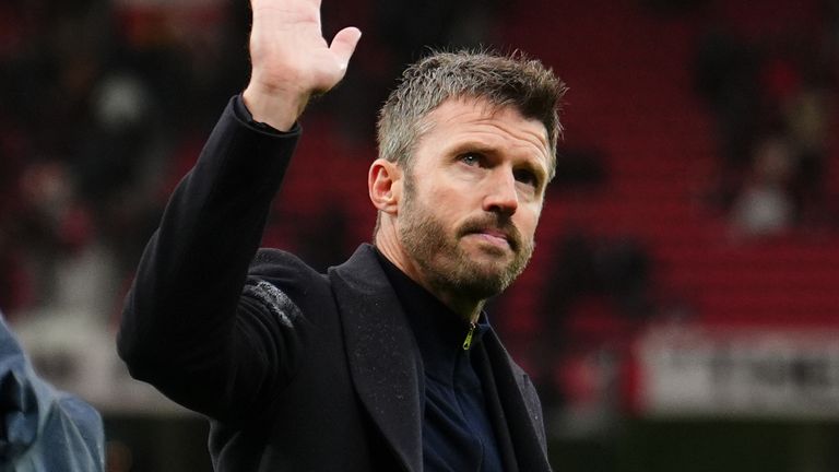 Michael Carrick waves to supporters at Old Trafford after his team's 3-0 loss to Bournemouth