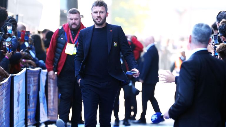 Manchester United manager Michael Carrick arrives for the Premier League match at Stamford Bridge