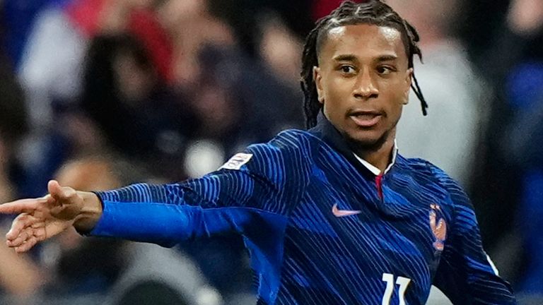 France's Michael Olise celebrates after scoring the opening goal during the UEFA Nations League Group A soccer match between France and Italy in Saint-Denis near Paris, Friday, Oct. 2, 2026. (AP Photo/Teresa Suarez)