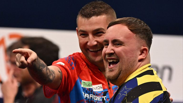 Nathan Aspinall and Luke Littler. Picture: Michael Cooper/PDC