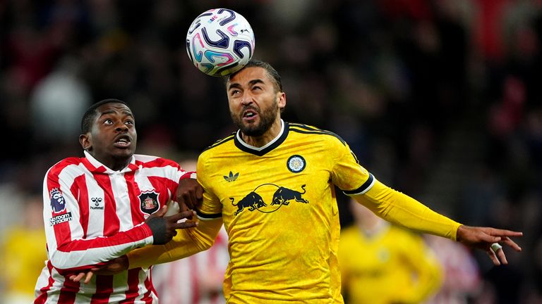 Sunderland's Noah Sadiki and Leeds United's Dominic Calvert-Lewin battle for the ball 