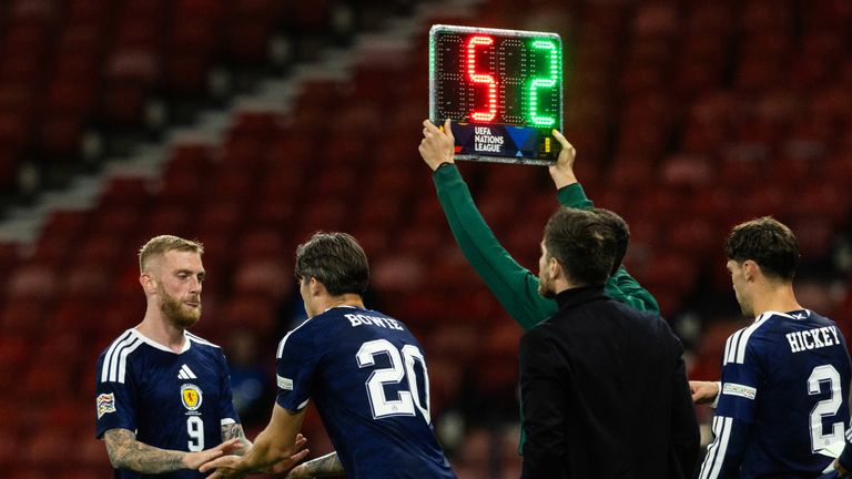 Oli McBurnie (left) made a Scotland return after eight years