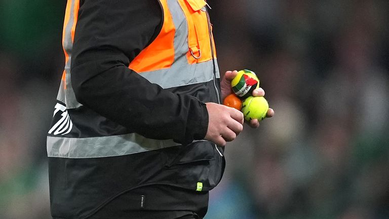 Protesters interrupted Ireland's game against Austria by throwing tennis balls onto the pitch with Palestine flags on them 