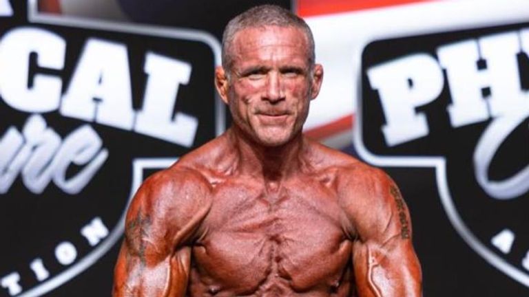 Former England international Phil Vickery posing during bodybuilding contest