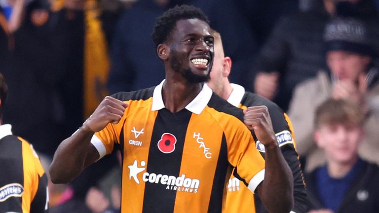 Tim Iroegbunam celebrates after equalising for Hull against Ipswich