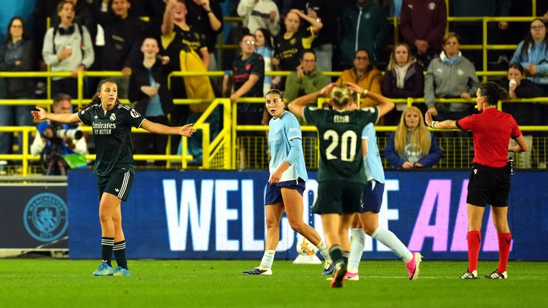 Real Madrid's Silvia Cristobal (left) reacts after referee Silvia Gasperotti (right) rues out a goal during the UEFA Women's Champions Leagu