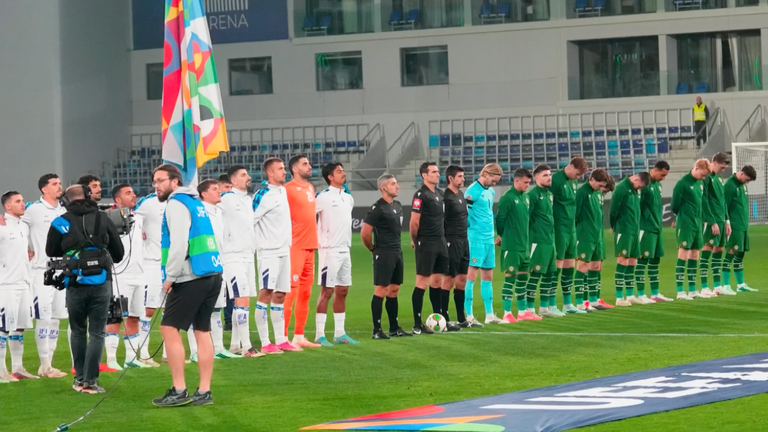 Republic of Ireland players bowed their heads during the national anthem