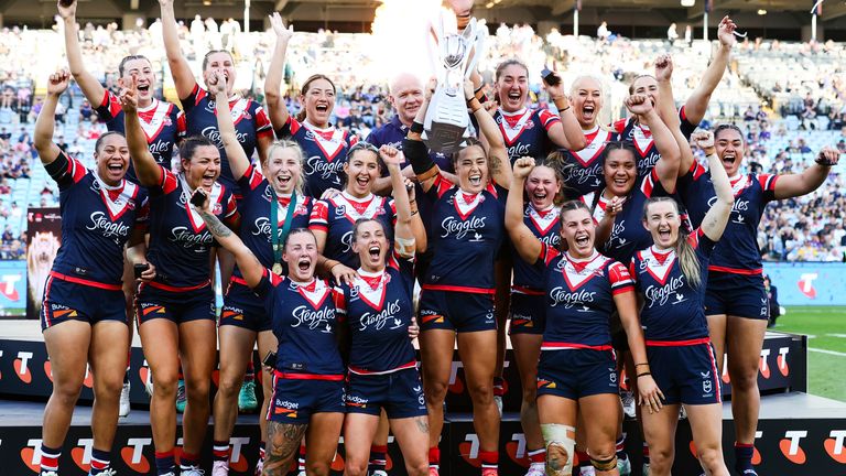 SYDNEY, AUSTRALIA - OCTOBER 06: Roosters players celebrate winning the Grand Final during the NRLW Grand Final match between Roosters and Sh