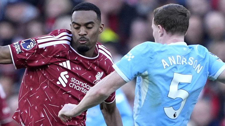 Liverpool's Ryan Gravenberch and Manchester City's Elliot Anderson (right) battle for the ball during the Premier League match at Anfield, L