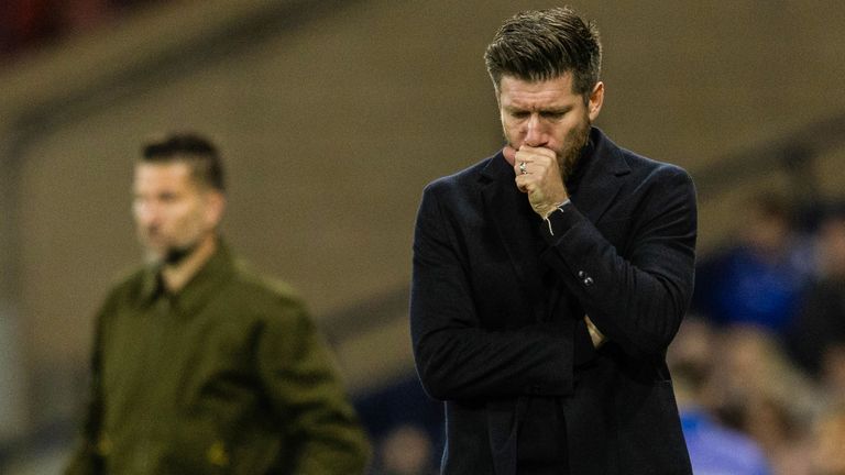 Sebastien Pocognoli looks dejected after Scotland's defeat to Slovenia