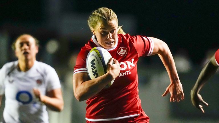 Canada's Sophie de Goede scores a try against England as teammate Julia Omokhuale follows.. (Justin Tang/The Canadian Press via AP)